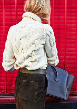 Wool sweater and suede skirt